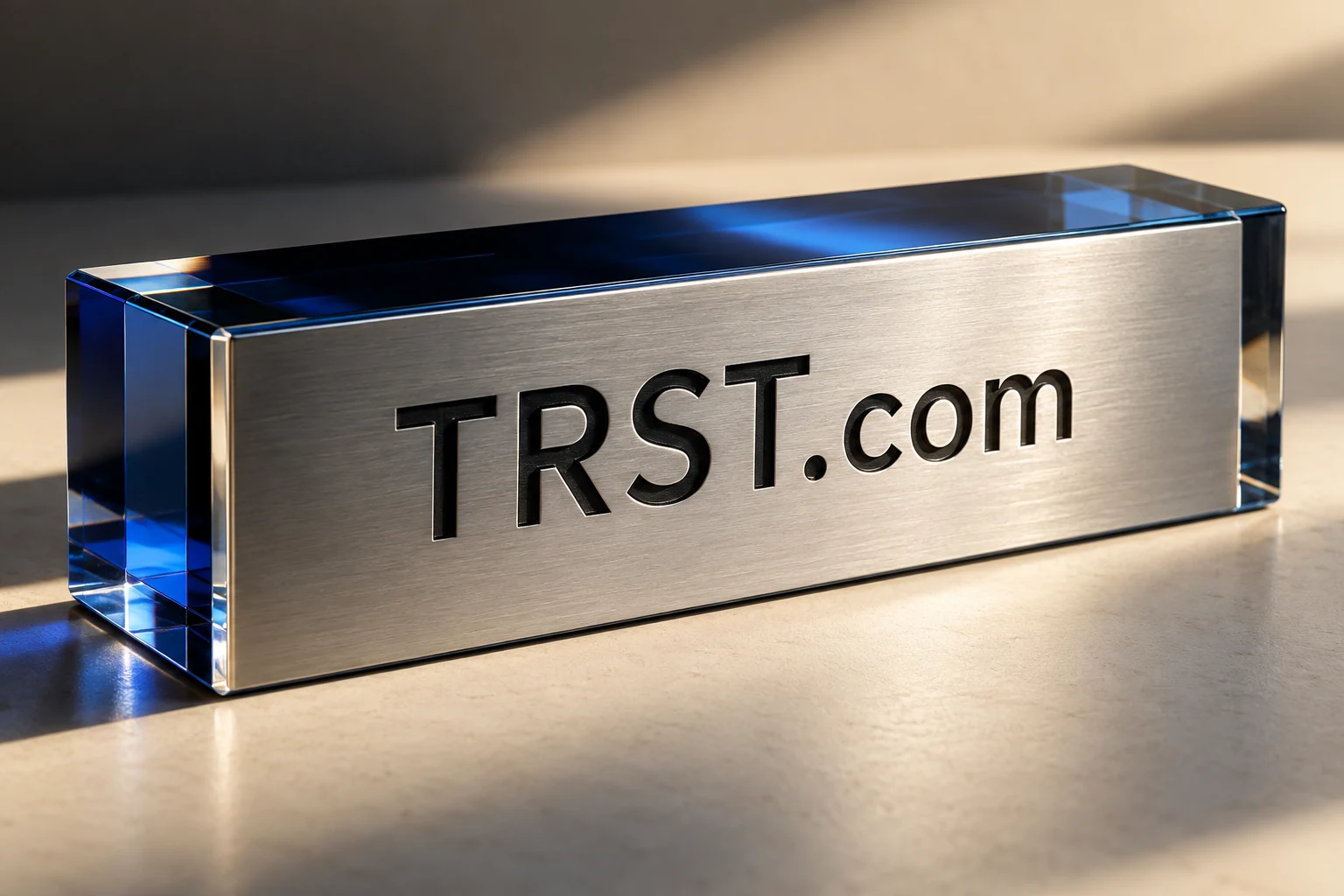 TRST.com engraved on a precision brushed aluminum object